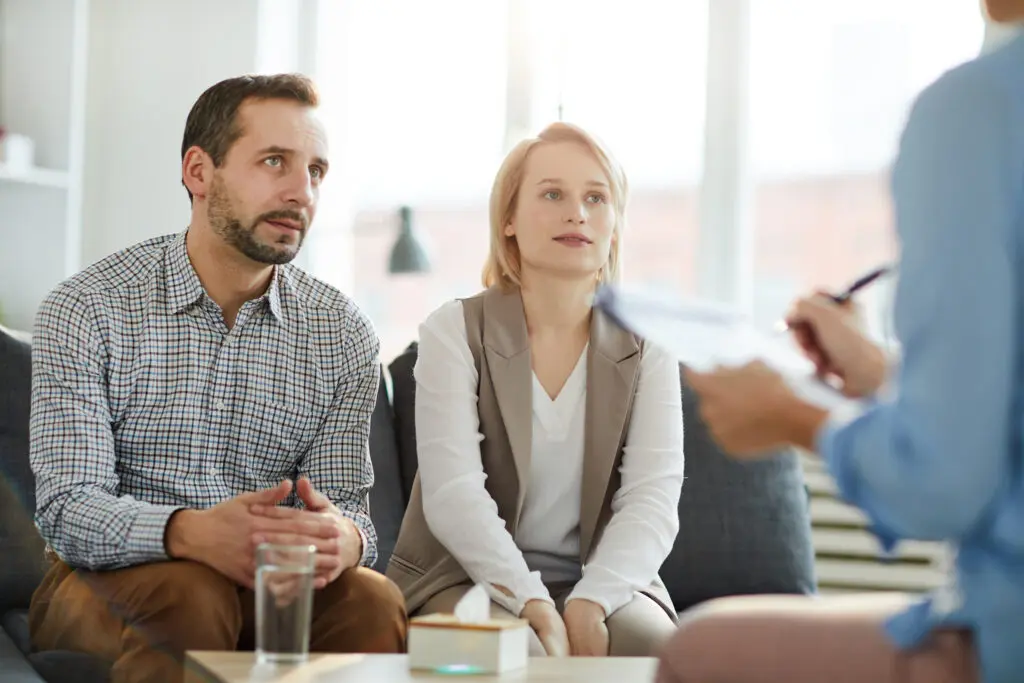 A couple recieving couples counseling services in Washington State