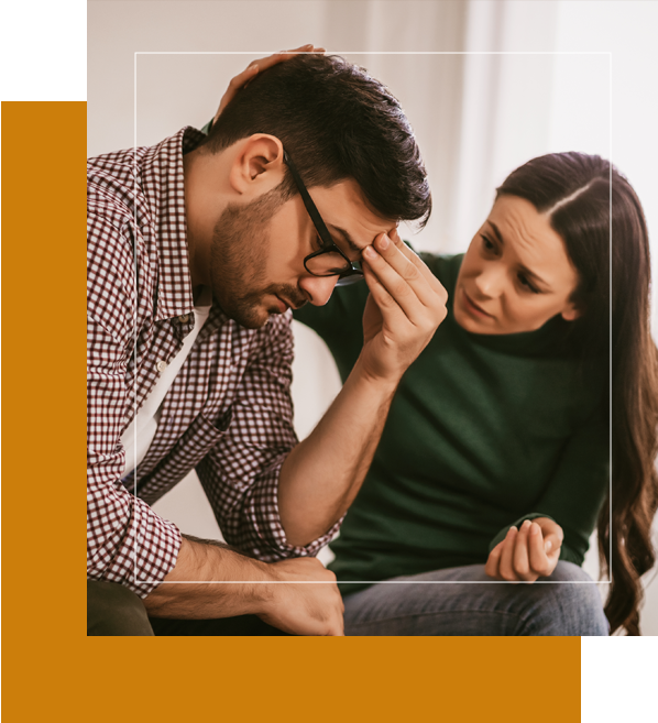 Woman comforting her spouse. Couples counseling services in Seattle Washington can help you strengthen your relationship.